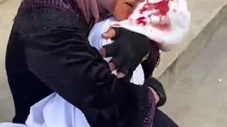 آخرین لالایی را در گوش عزیزش میخواند در حالی که لباسش گلگون است... یا الله 