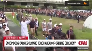حمل مشعل المپیک 2024 پاریس توسط اسنوپ داگ، خواننده مطرح آمریکایی