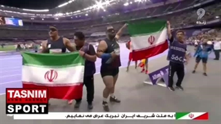 دور افتخار اولاد و علیپور با پرچم ایران در ورزشگاه استادوفرانس