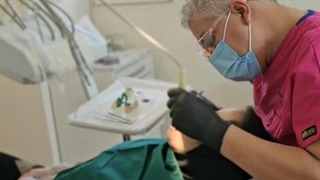 عصب کشی و روکش دندان در میدان پاستور تهران