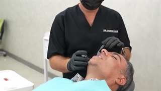 عصب کشی دندان به همراه روکش و ایمپلنت