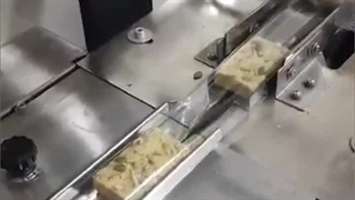 دستگاه بسته بندی حلوا شکری ماشین سازی عدیلی